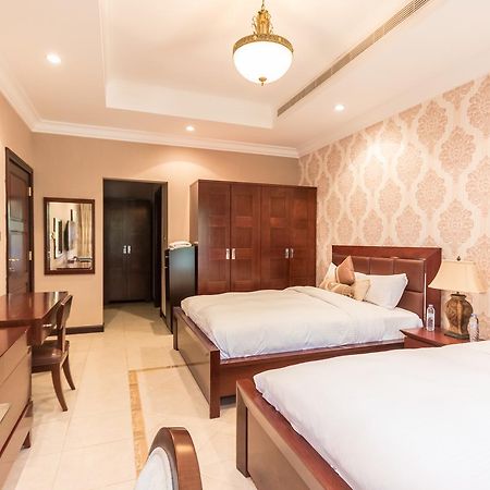Yanjoon Holiday Homes - Palm Jumeirah Frond A Villas Dubaj Kültér fotó