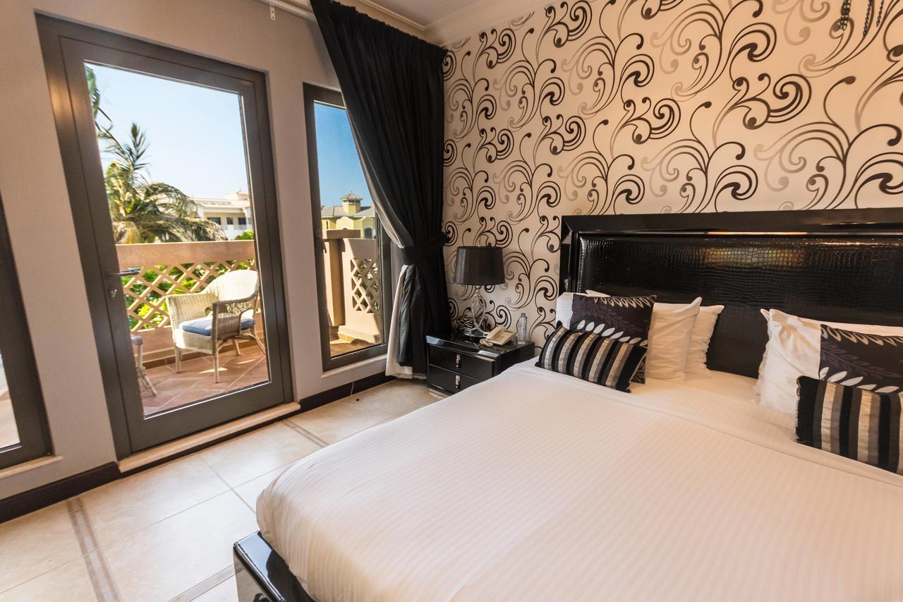 Yanjoon Holiday Homes - Palm Jumeirah Frond A Villas Dubaj Kültér fotó